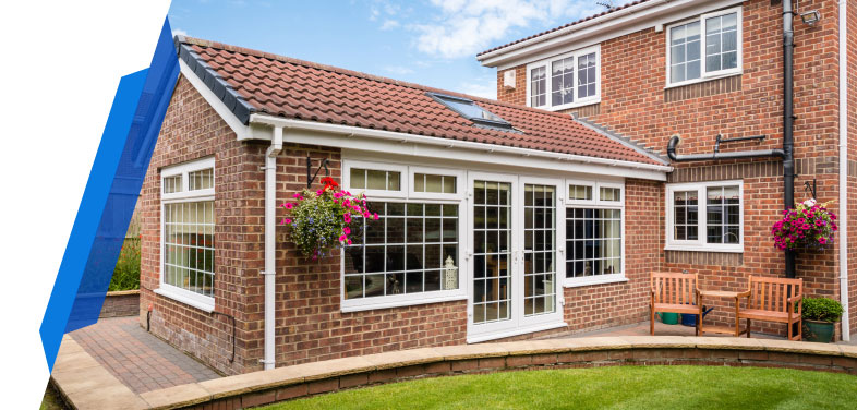 Smart Cover Door and Windows Insurance - house with multiple windows and a front door, representing coverage for doors and windows against damage or break-ins.