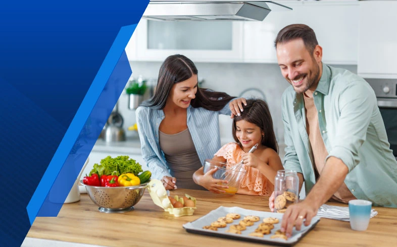 Family baking in kitchen, promoting Smart Cover appliance insurance