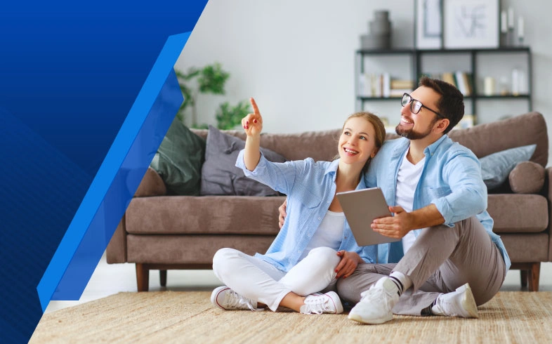 Couple using tablet to get a quote from Smart Cover, an award-winning insurance provider