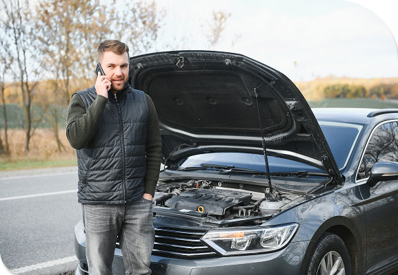 A man is calling motor breakdown cover support after his car broke down.