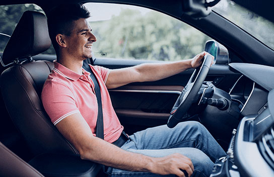 Confident driver with smart cover roadside assistance and breakdown insurance protection